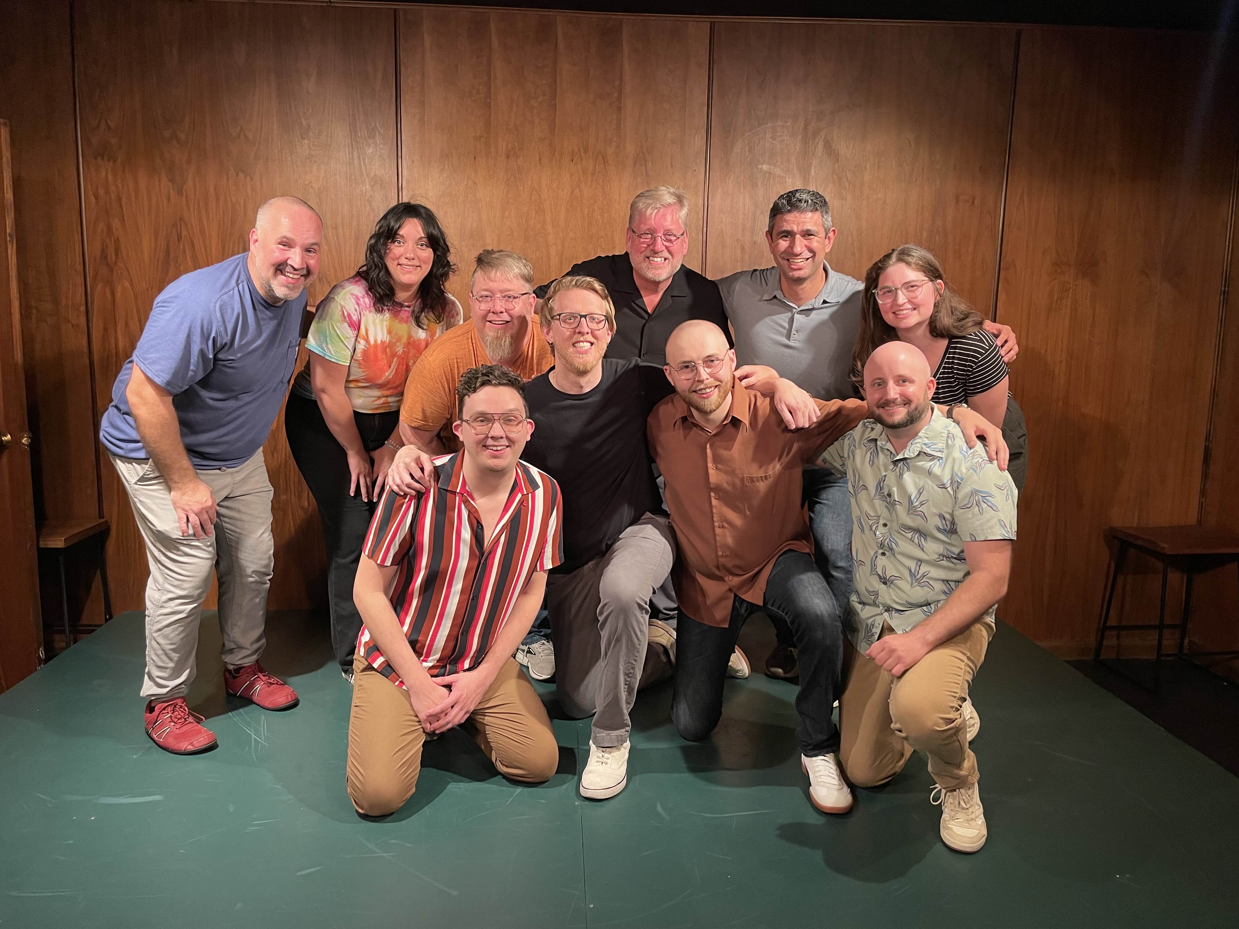 The Offbeat Musical Improv troupe group photo after a performance